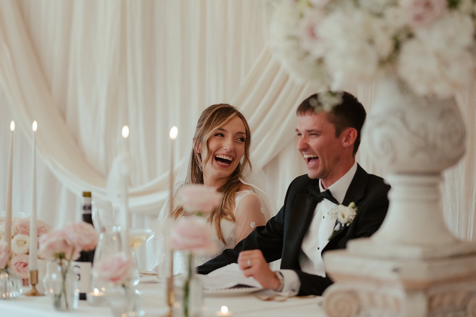 Bride and groom laughing at Worstead Estate wedding