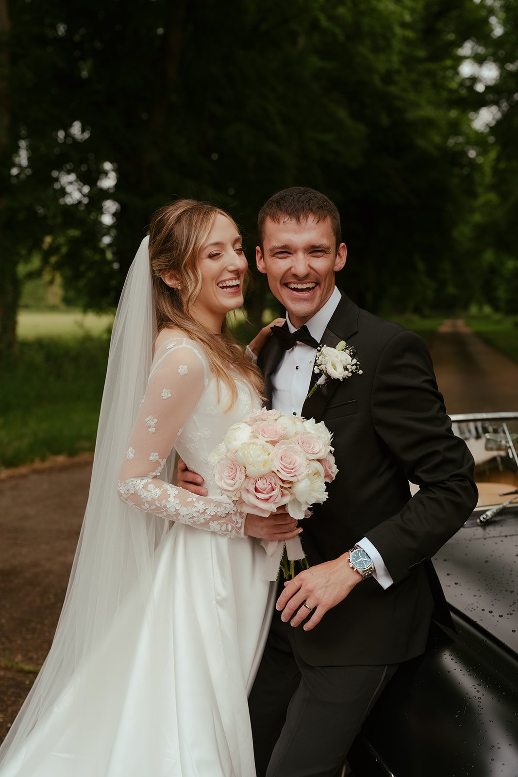 The bride and groom laughing portrait at Worstead Estate