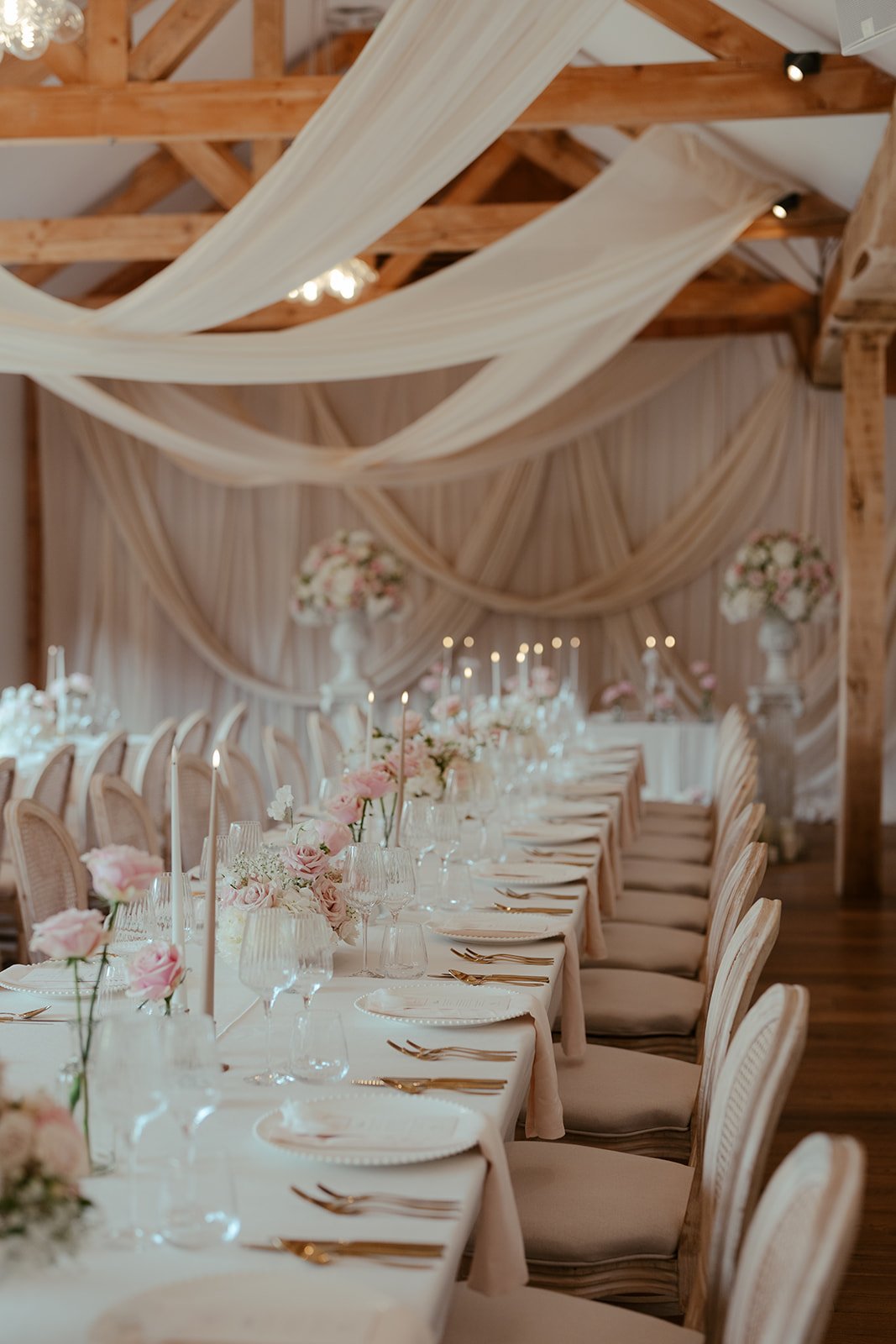 Tablescape view with candles and florals at Worstead Estate