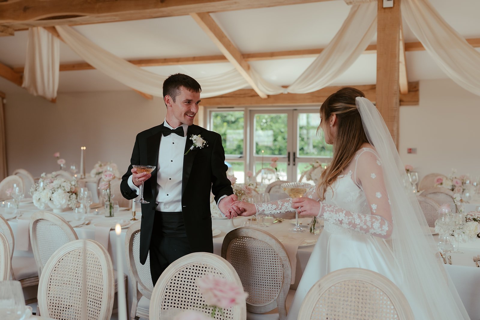 The bride and groom having first look at the table scape at Worstead Estate