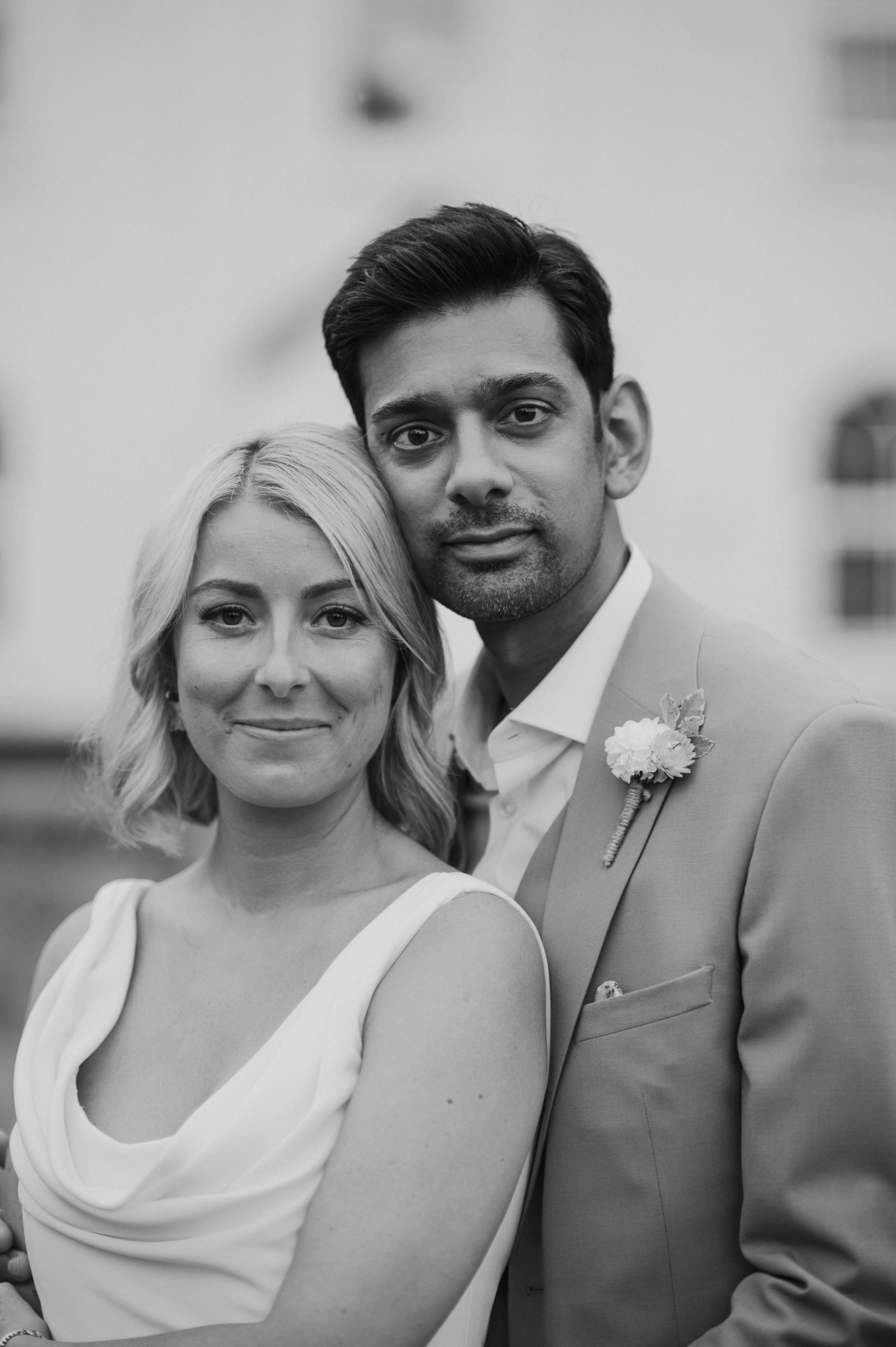 A close up of Amy and Amit on their wedding day at Worstead Estate
