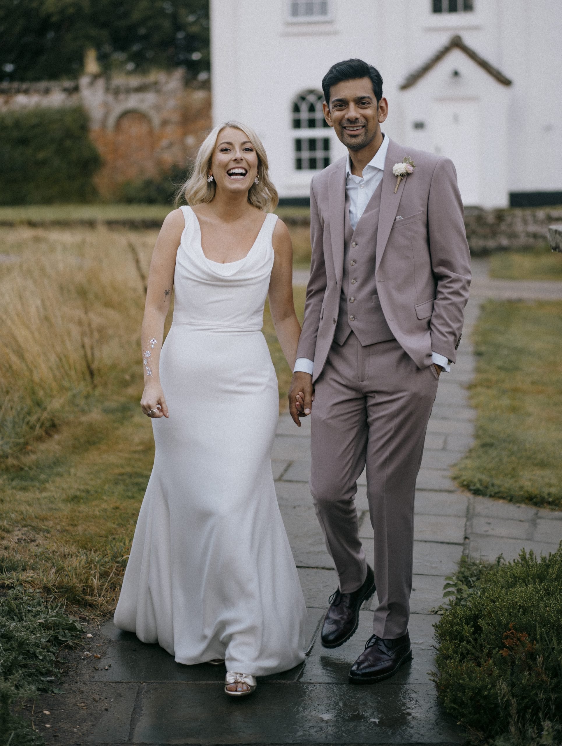 The happy couple on their wedding day at Worstead Estate