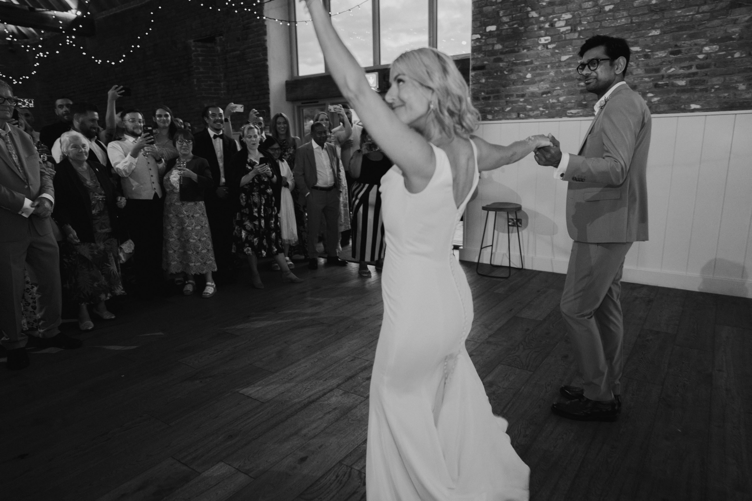The bride and groom dancing on their wedding day at Worstead Estate