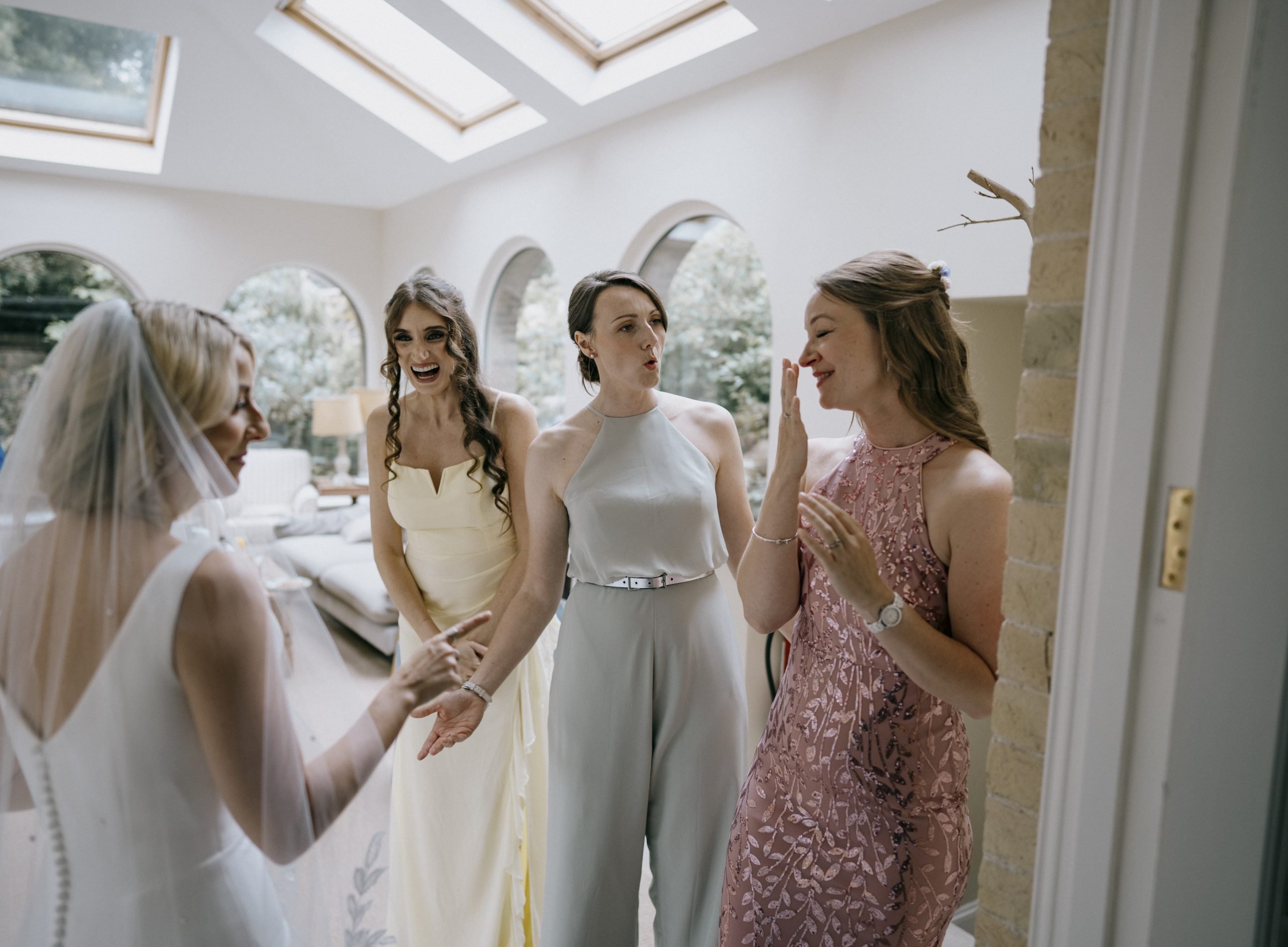 Bride first look with bridesmaids