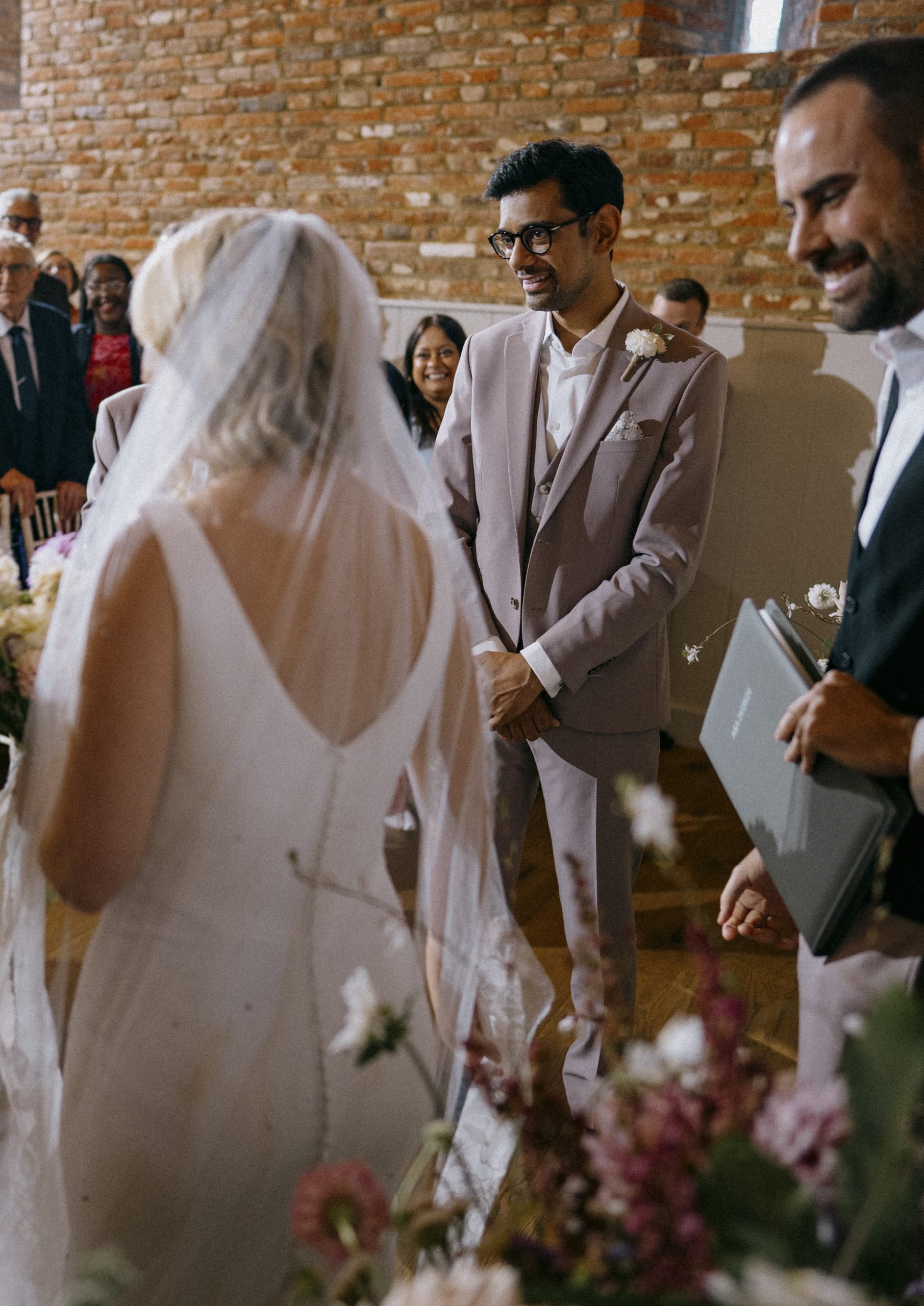 Bride and groom at the ceremony at Worstead Estate