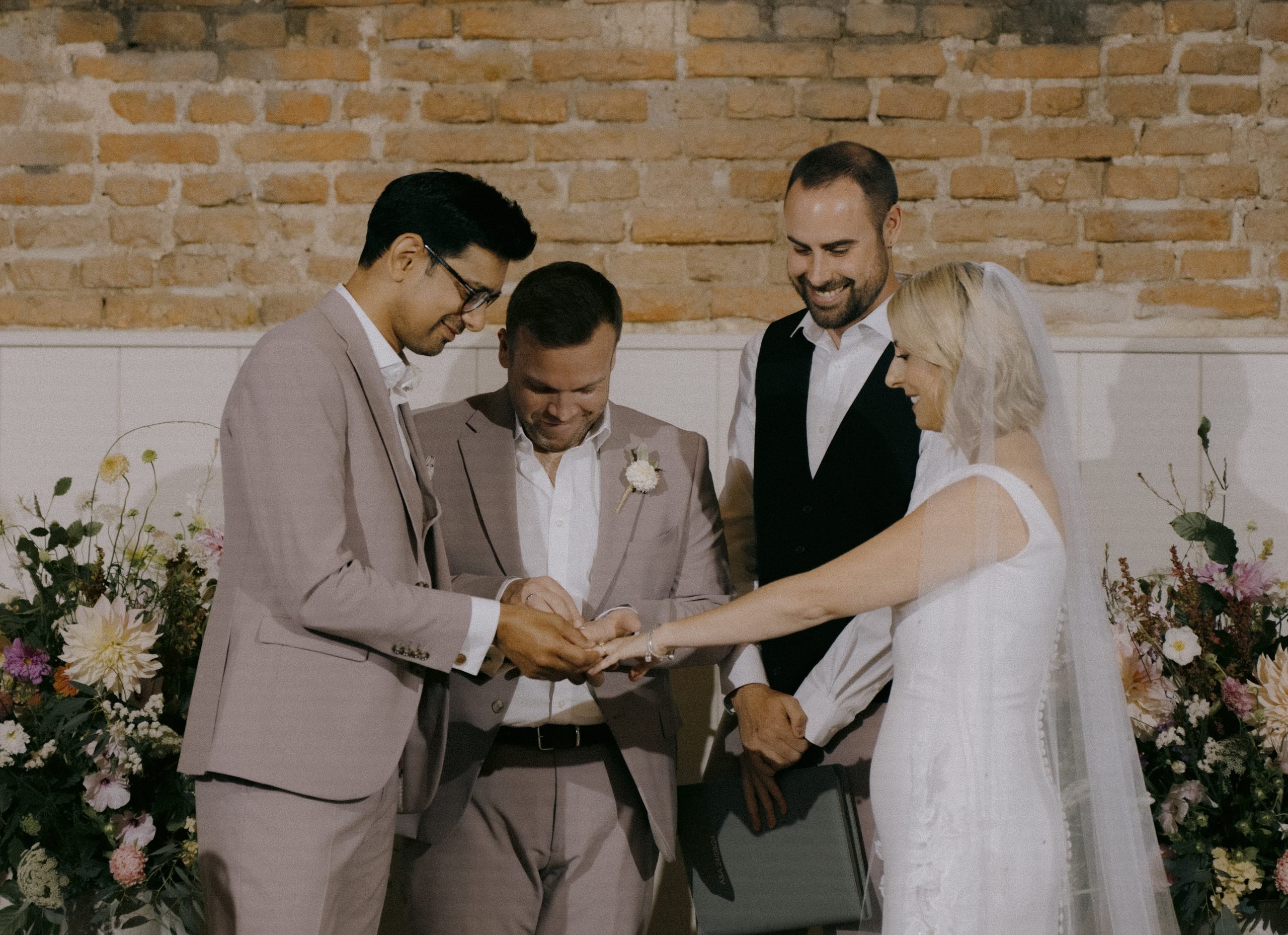 Exchange of rings at wedding ceremony at Worstead Estate