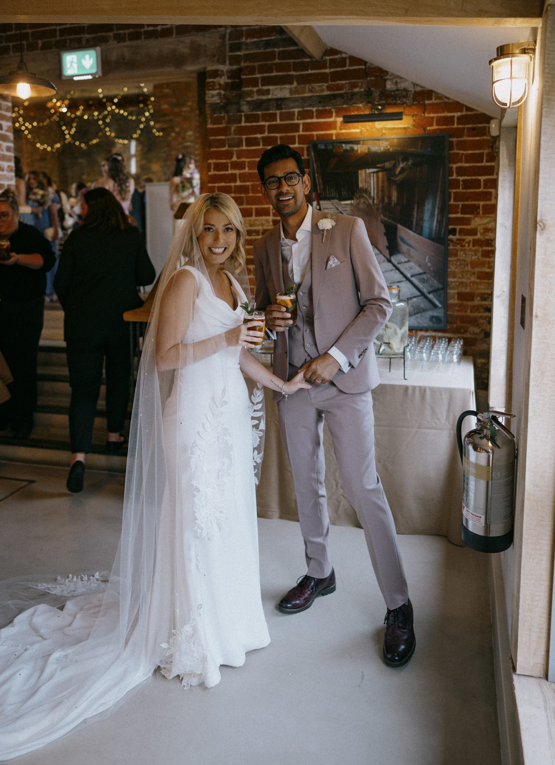 Amy + Amit, the bride and groom at Worstead Estate