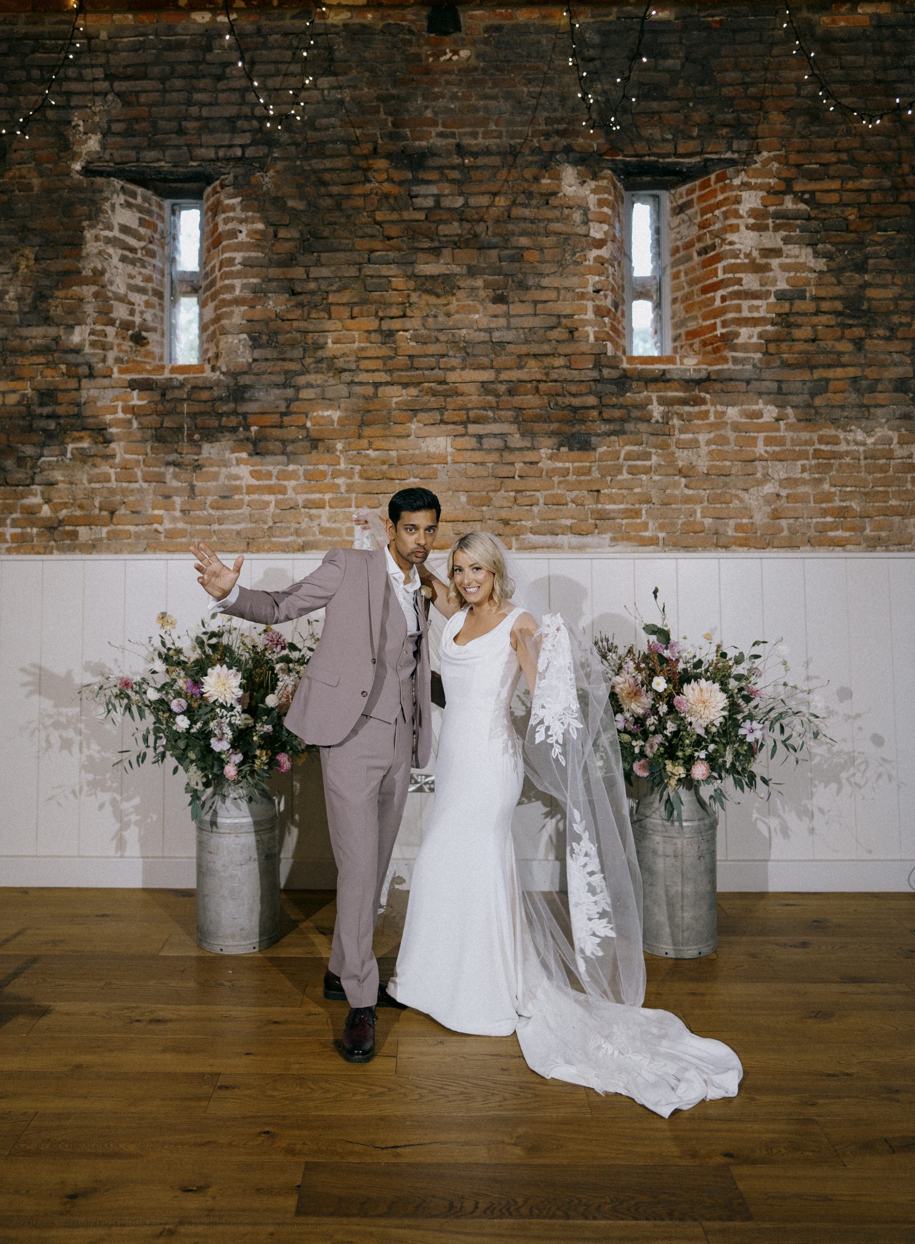 Amy + Amit, the bride and groom at Worstead Estate