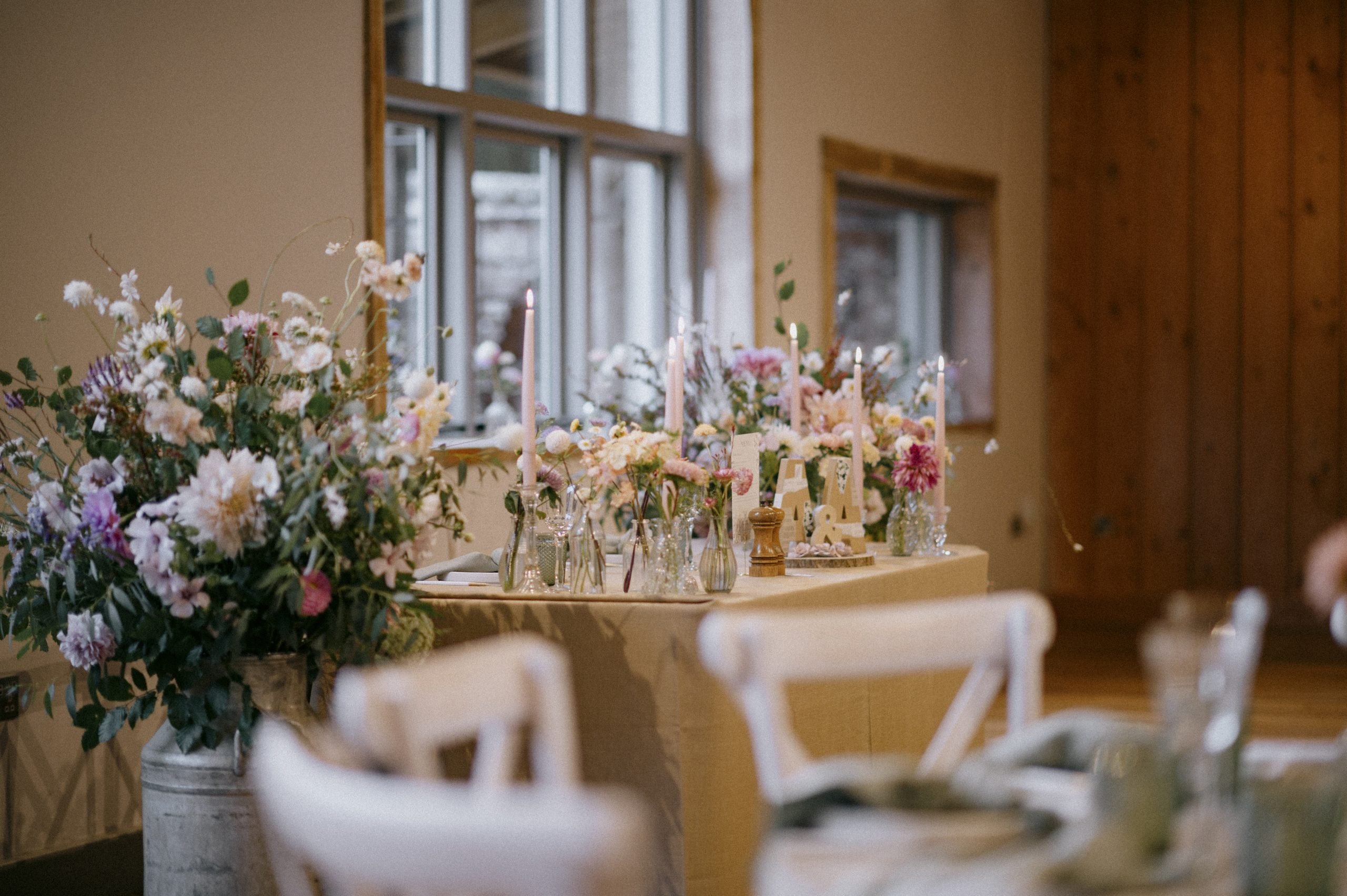 Wedding florals by Blumstead Blooms and tablescape at Worstead estate wedding