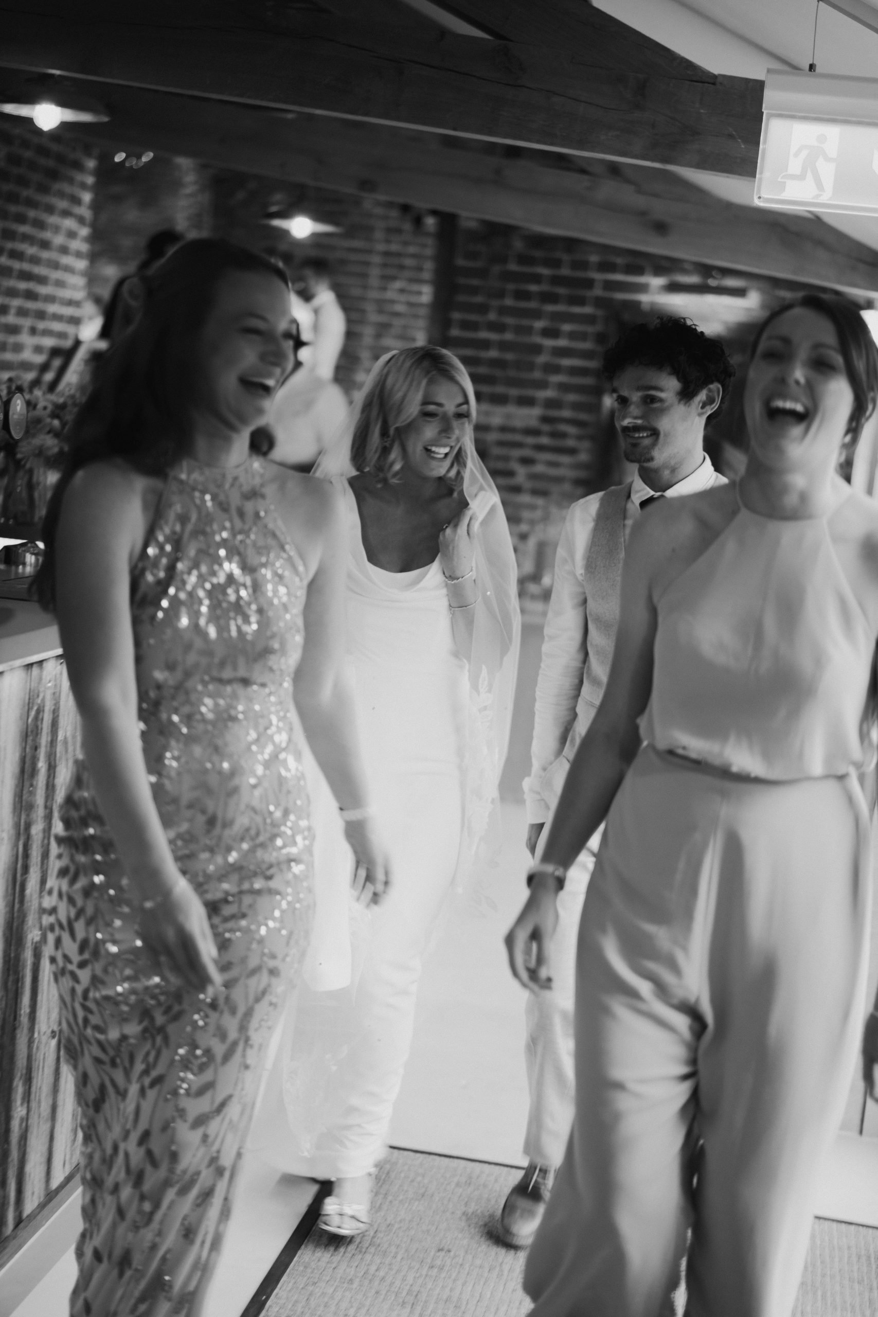 Bride and bridal party at wedding at Worstead Estate