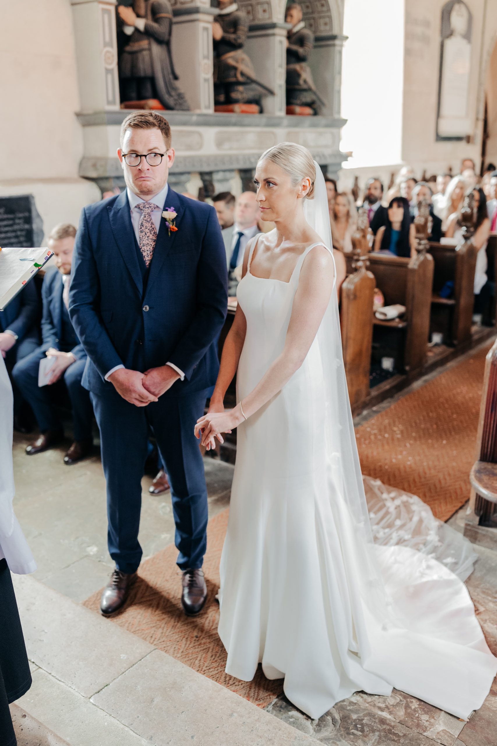 Bride and groom stood at the front of the aisle on their wedding day. coordinated by Hardesty Event Design