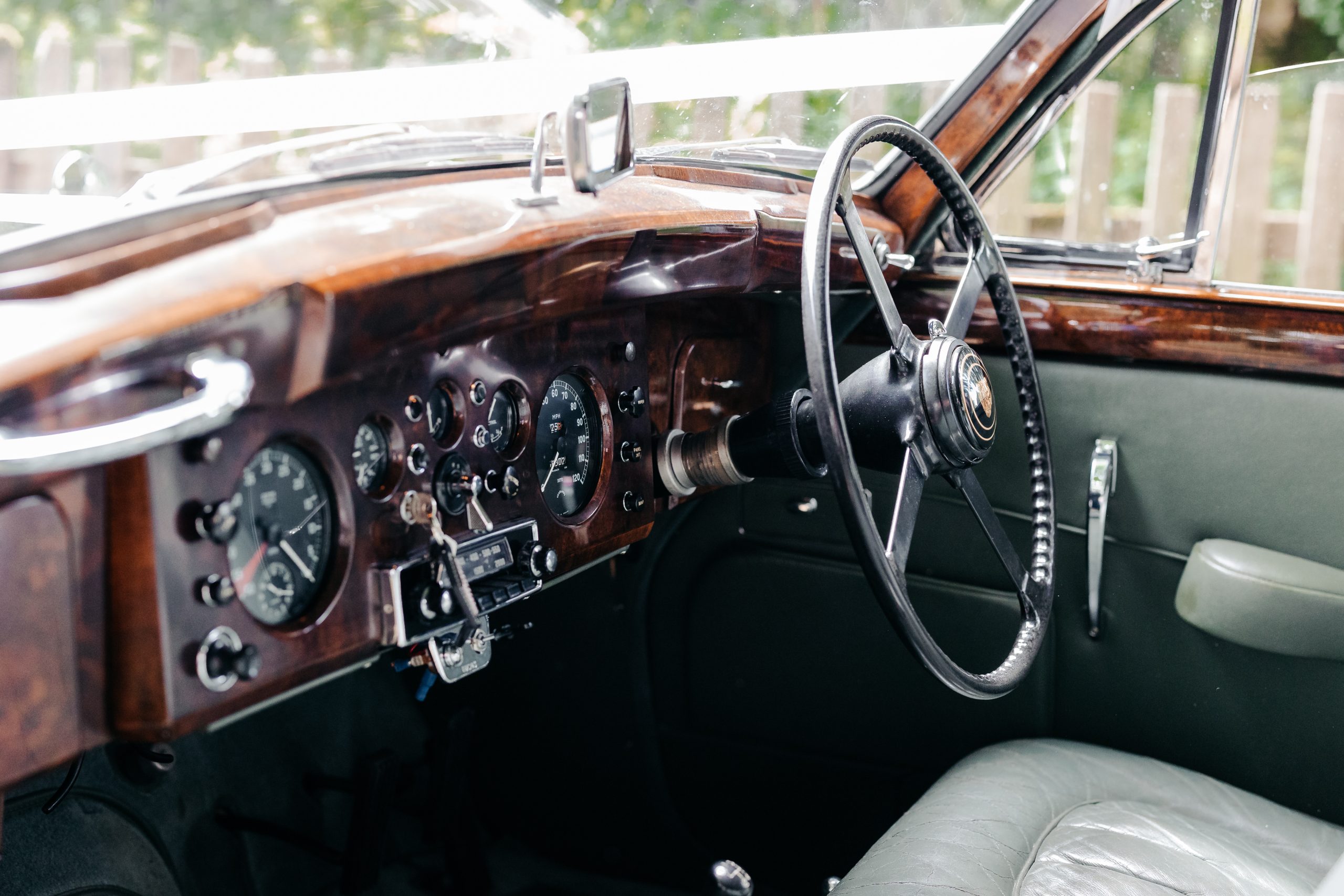 interior of wedding car on Emma and Luke's wedding day in suffolk