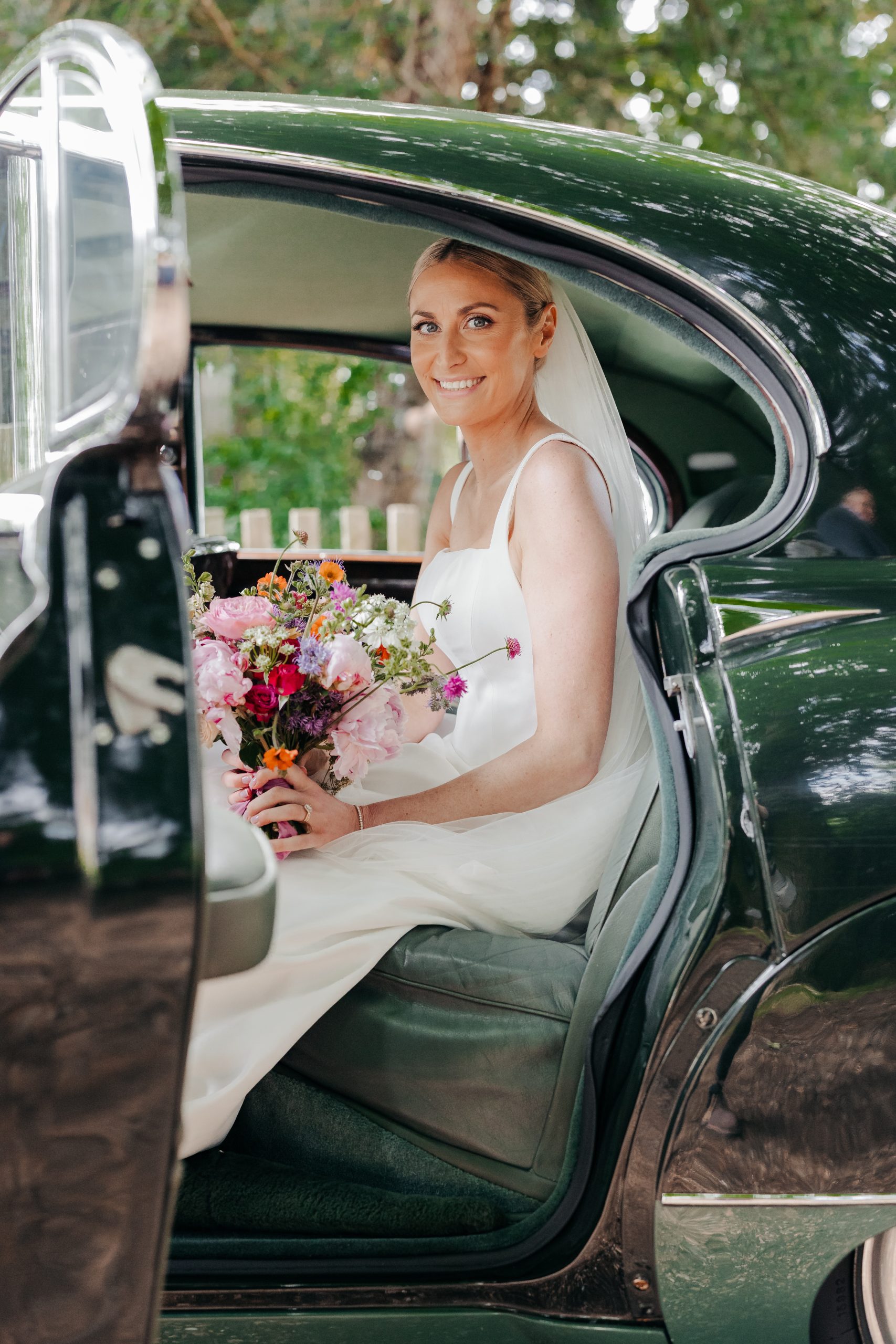 bride Emma arriving at church for her wedding in Suffolk, coordinated by uk wedding coordinators Hardesty Event Design