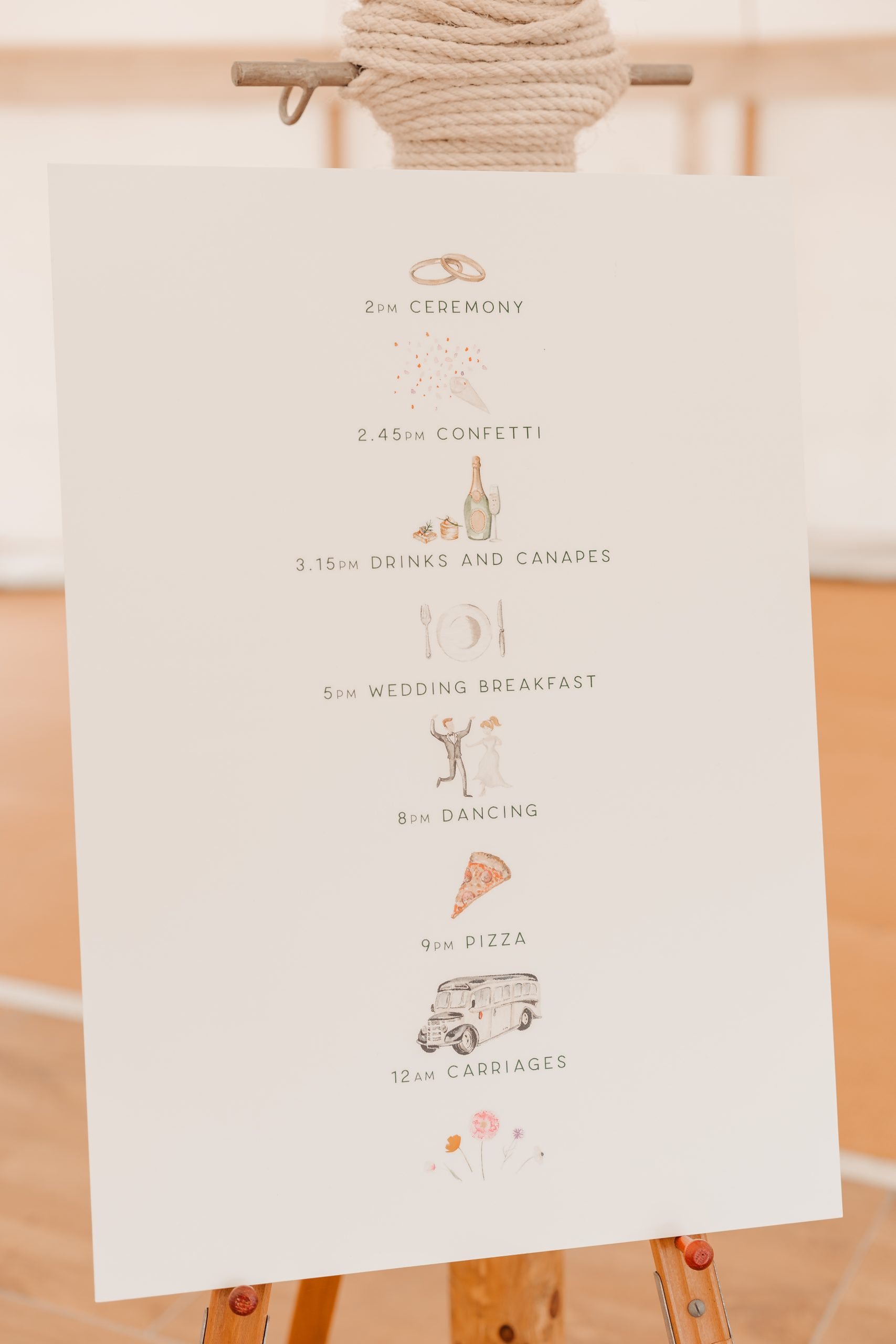 Close-up of elegant stationery and signage from a marquee wedding at Helmingham Hall