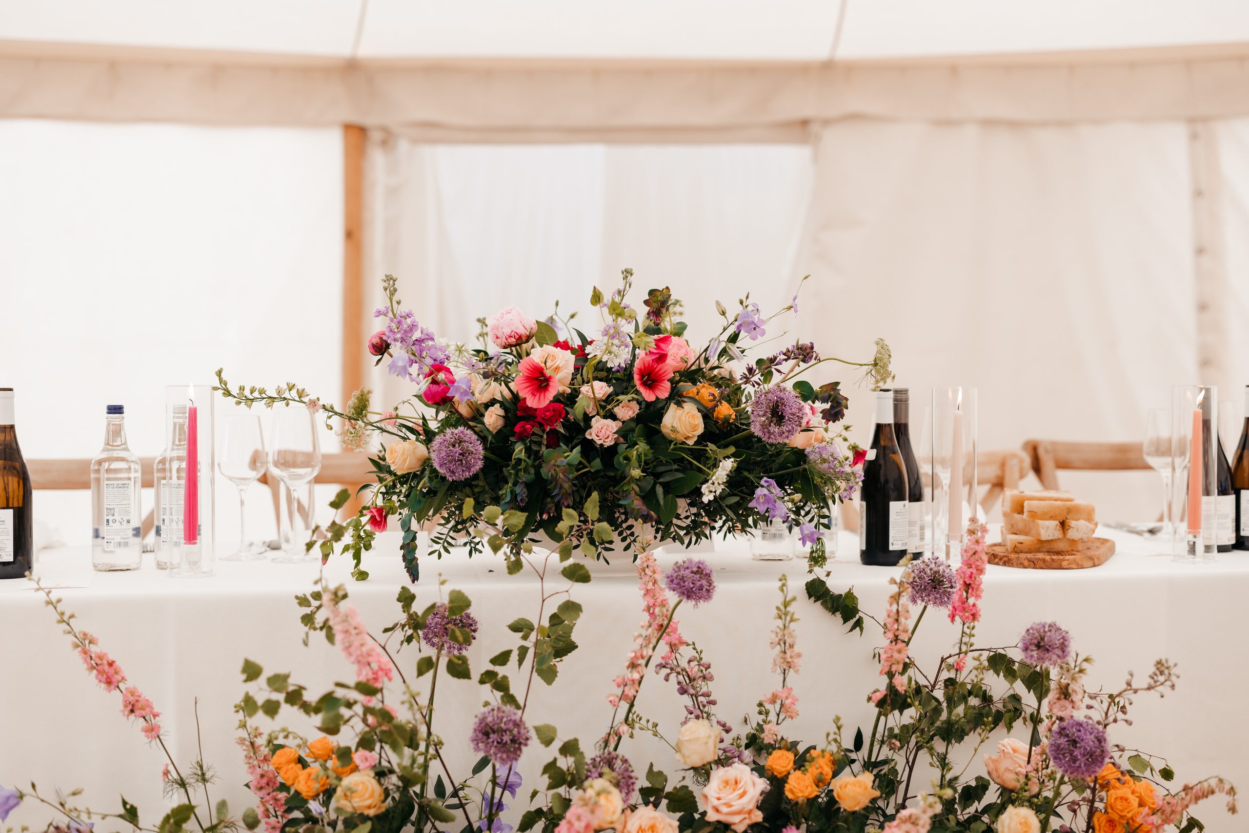 Close-up of floral décor from a marquee wedding at Helmingham Hall, suffolk
