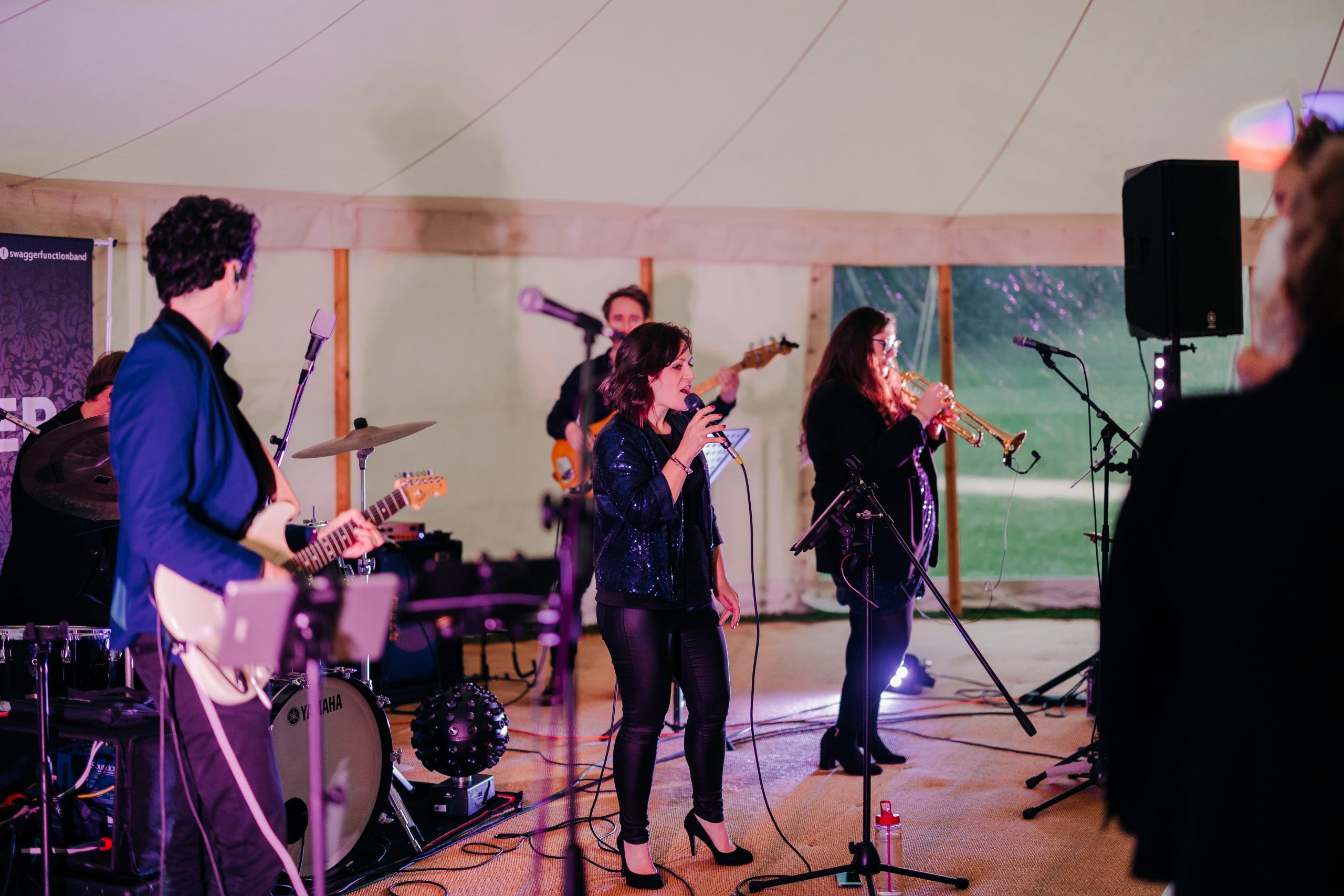 wedding band performing in marquee at Helmingham Hall, suffolk for Emma and Luke's marquee wedding reception