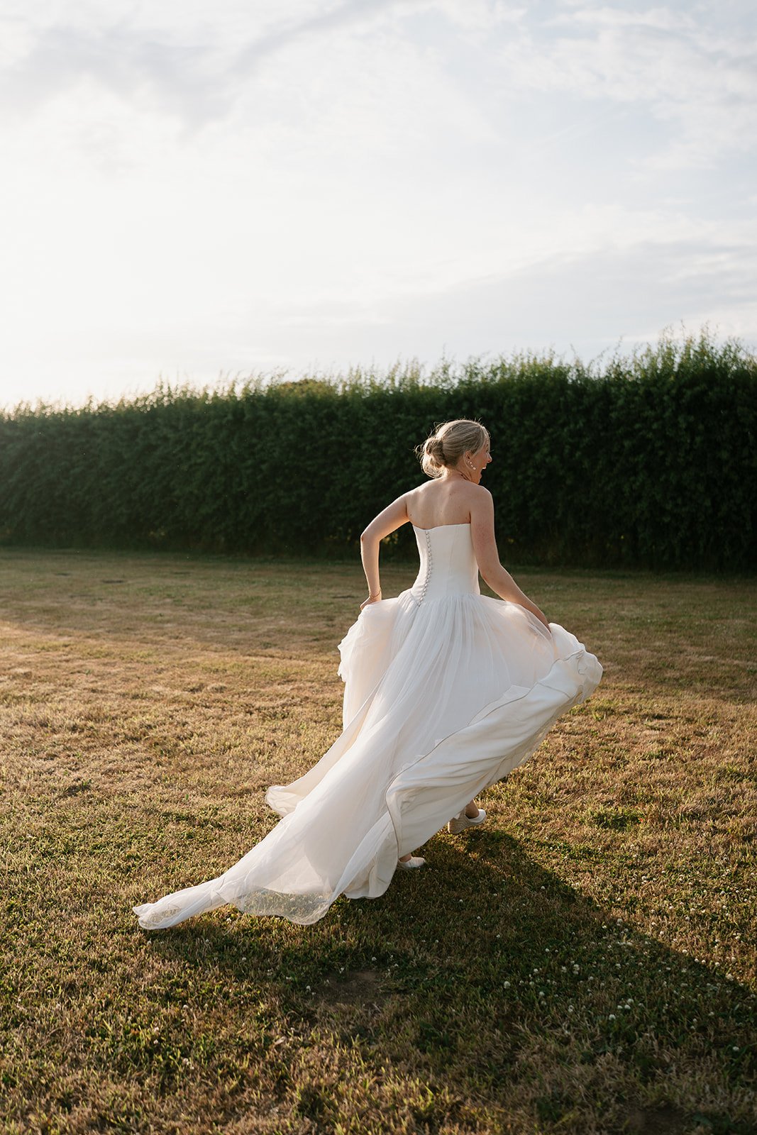 Charlotte in her bespoke made Emma Beaumont gown on her wedding planner