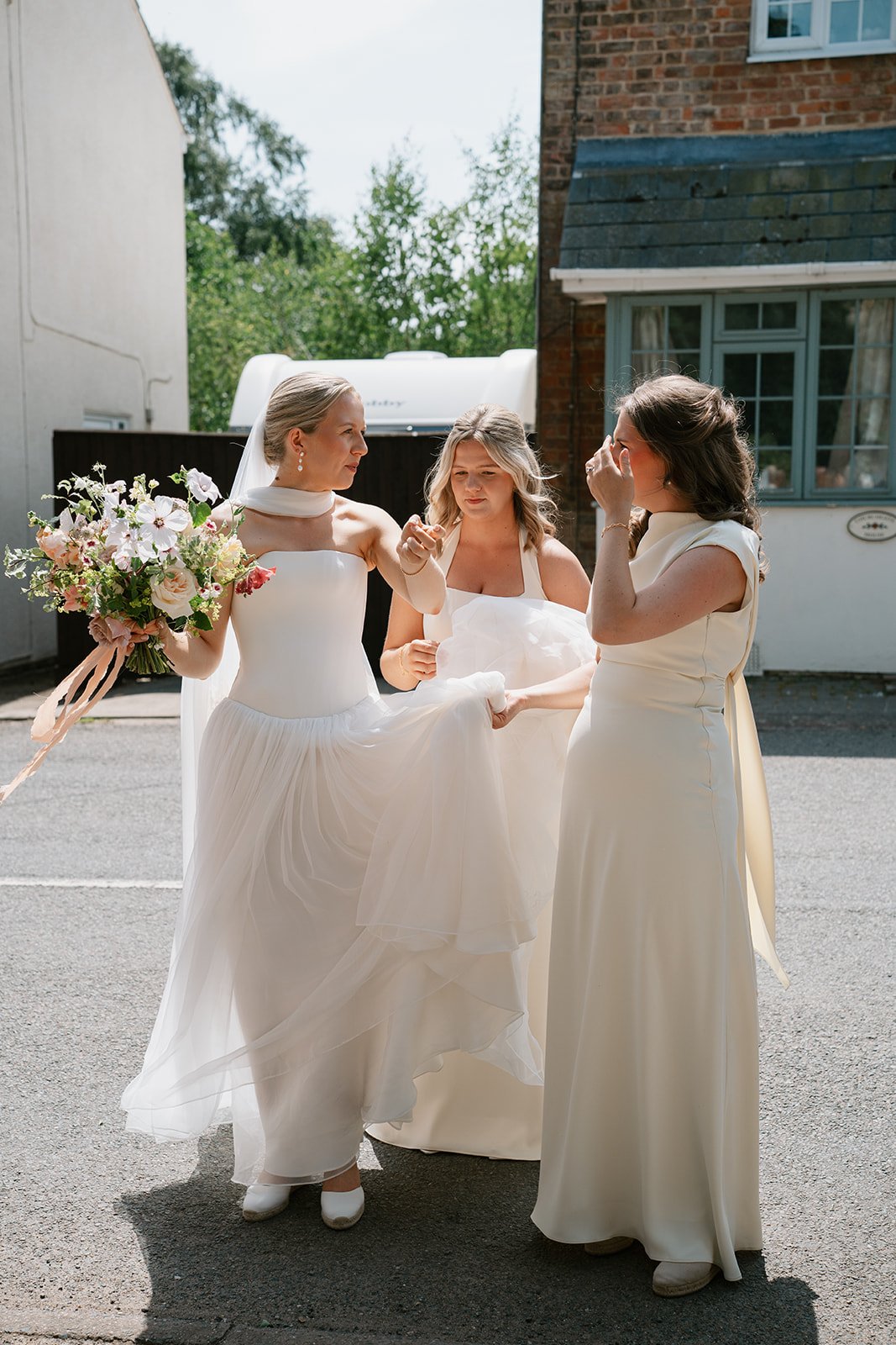 Bride with her bridesmaids before church ceremony, coordinated by Hardesty Event Design