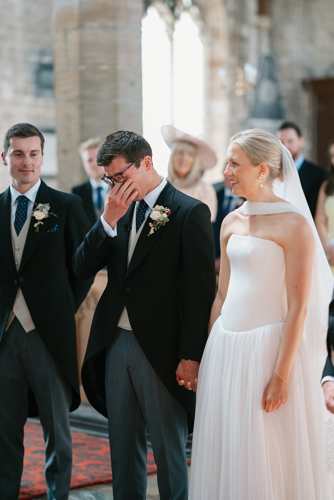 Bride and groom at church ceremony, coordinated by UK luxury wedding planners Hardesty Event Design