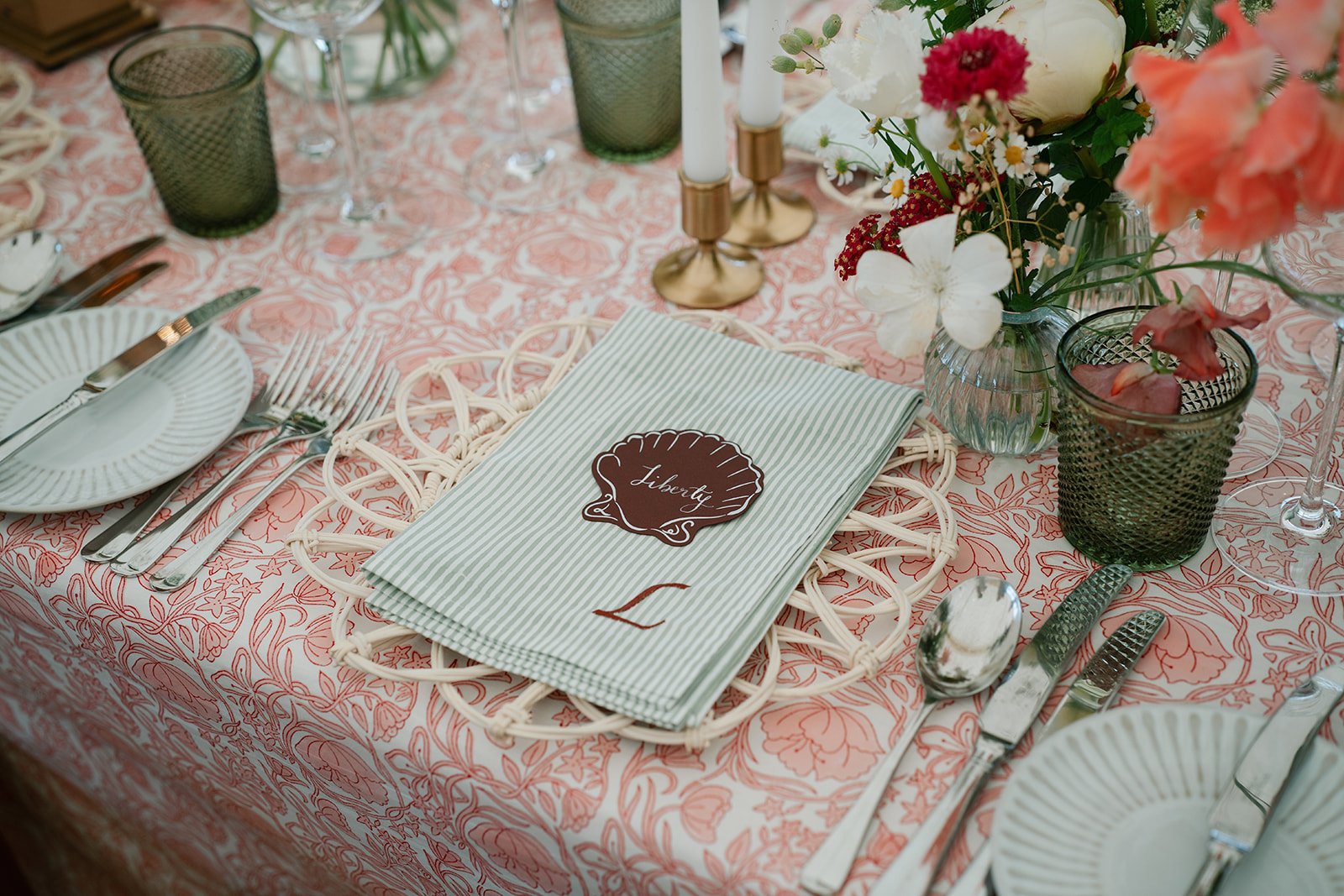 Close-up of hand-printed textile tablecloth designed by the bride, used at her marquee wedding