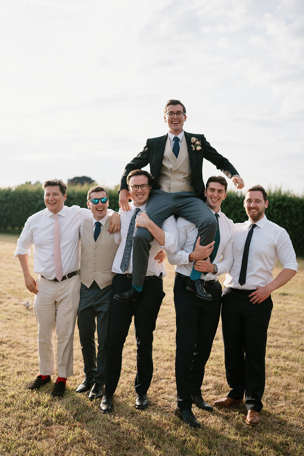 groom with friends at his wedding reception in South Lincolnshire, coordinated by Hardesty Event Design